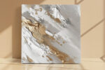 Diagonal impasto brushstrokes in off-white, warm gray, and gold, abstract oil-texture canvas for living room or home office