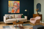 Woman in red beret and orange sunglasses at cafu00e9 booth, warm amber mixed-media portrait canvas for living room