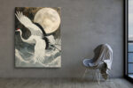Red-crowned crane in flight before a full moon, dark slate and ivory gold tones, japandi wall art canvas for living room