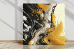 Fluid abstract paint swirls in amber gold and deep black, bold contemporary wall art canvas for living rooms