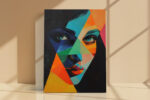 Geometric female face in teal, cobalt blue and vivid orange triangles, bold acrylic portrait canvas wall art