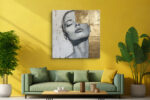 Female portrait in grey linework and warm gold panels, contemporary mixed-media canvas art for living room or home office
