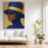 Woman in wide-brim hat with gold band and royal blue head wrap, high-contrast fashion portrait canvas for living room