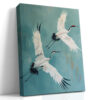 Two red-crowned cranes in mid-flight, muted teal acrylic, japandi wall art canvas for living room or bedroom
