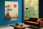 Pine cliff and crimson sun disc ink-drawing landscape in warm cream and burnt red, japandi wall art for bedroom