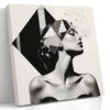 Woman's profile with black diamond geometric shards and ink splatter, bold monochrome mixed-media canvas wall art