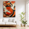 Two red-crowned cranes in flight, vivid red-orange geometric background, bold contemporary canvas wall art for living room