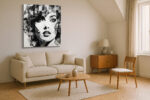 Woman's face with geometric shards and ink splatter in black and white, bold mixed-media portrait canvas wall art