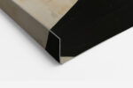 Close-cropped female portrait bisected by geometric shapes in near-black, red and off-white, contemporary wall art canvas