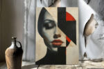 Close-cropped female portrait bisected by geometric shapes in near-black, red and off-white, contemporary wall art canvas