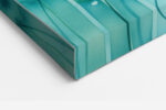 Translucent watercolor flowers on teal stems with paint splatters, pastel botanical wall art for bedroom or living room