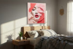 Female face emerging through coral pink geometric paper layers, bold red lips portrait mixed-media canvas for living room