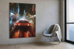 Red sports car on rain-slicked neon city street, bold moody digital art canvas for living room or home office