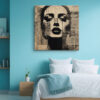 Woman's face with ink tear streaks over aged newsprint collage, moody monochrome mixed-media portrait canvas wall art