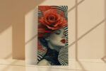 Woman's face with oversized red rose and Op Art swirling stripes, bold dramatic portrait canvas wall art