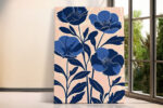 Four cobalt and navy poppy blooms in linocut illustration style, blush peach background, botanical wall art canvas print