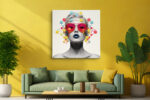 Black-and-white woman portrait with vivid molecular structures, red sunglasses, blue lips, bold mixed-media canvas