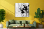Bold black abstract silhouette with geometric arc lines and ink splatters, monochrome mixed-media canvas art for living room