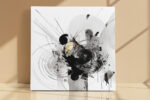 Abstract ink swirls and radiating lines in black, grey, and amber gold on white u2014 bold contemporary wall art canvas