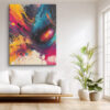 Abstract acrylic paint burst in vivid yellow, magenta, and cyan on dark navy, bold wall art canvas for living room