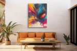 Abstract acrylic paint burst in vivid yellow, magenta, and cyan on dark navy, bold wall art canvas for living room