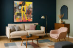 Bold afro woman in vivid yellow suit with vinyl records and paint drips, retro mixed-media portrait canvas wall art