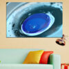 Abstract composition featuring layered blue drops and circular forms against a soft neutral background