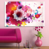 An abstract flower unfolds in warm reds, oranges, and yellows with cool blue accents radiating from the center