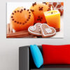 This canvas shows pastries arranged with fresh orange slices and a lit candle on a dark surface