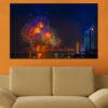 Five connected panels show golden fireworks exploding above a glowing city skyline at night