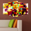 A geometric cube rendered in bold blocks of red, blue, yellow, pink, and cream spreads across five vertical panels
