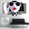 A pop art portrait featuring a girl with bold red lips rendered in graphic black and white