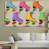 Five connected panels show vintage roller skates rendered in bold pop art colors