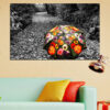 Vibrant wildflowers bloom against a soft-focus autumn forest backdrop
