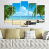 This five-piece canvas set shows a tropical beach scene with turquoise water, white sand, and palm trees under a clear blue sky