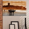 This canvas shows ocean waves meeting weathered stone architecture under a bright summer sky