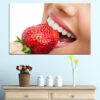 Fresh strawberries arranged into a cheerful smile against a clean white background