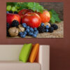 This canvas shows an arrangement of fresh fruit in vivid natural colors