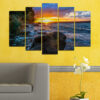 Five connected panels show a golden sunset descending over calm ocean waters