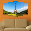 Five connected panels show the Eiffel Tower's iron lattice rising against a twilight sky