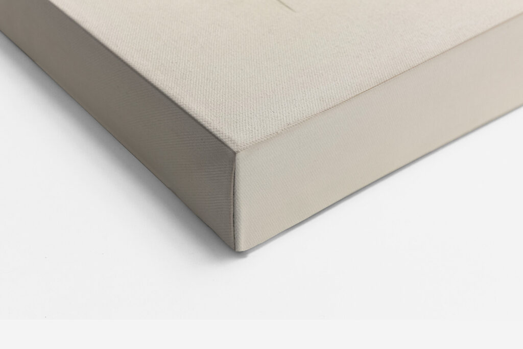 Close-up of a canvas corner showing the stretcher bar depth and gallery wrap