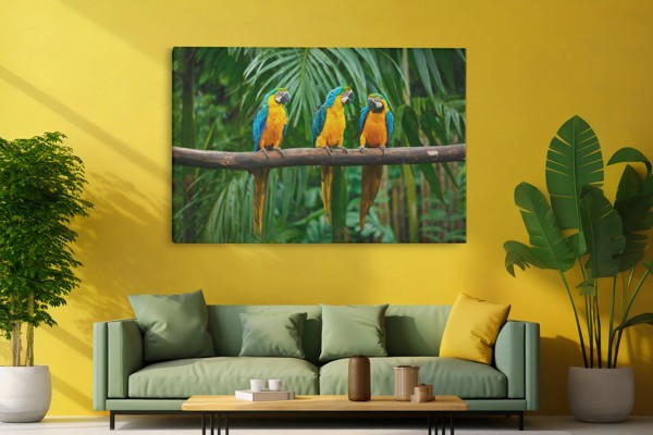 Three Parrots in Tropical Foliage Canvas Print - on the wall in a room interior