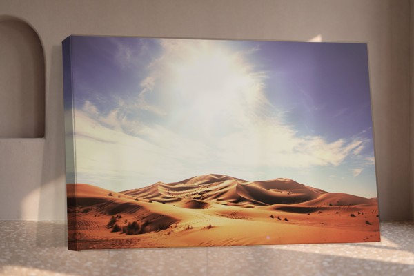 Desert Dunes Under Golden Sun Canvas Print - on the wall in a room interior