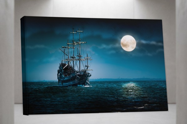 Battleship Under Moonlight Canvas Print - on the wall in a room interior
