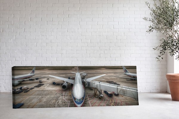 Impression sur Toile Biplan Vintage en Vol - au mur dans un intérieur
