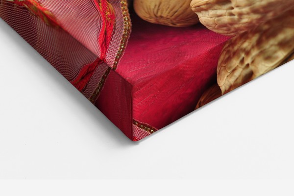 Christmas Apple with Nuts and Spices Canvas Print - on the wall in a room interior