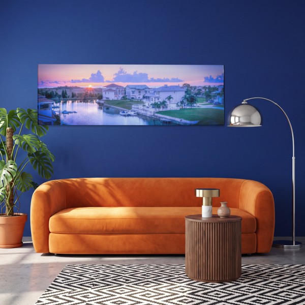 Zonsondergang Over Rivier Canvas Print - aan de muur in een interieur