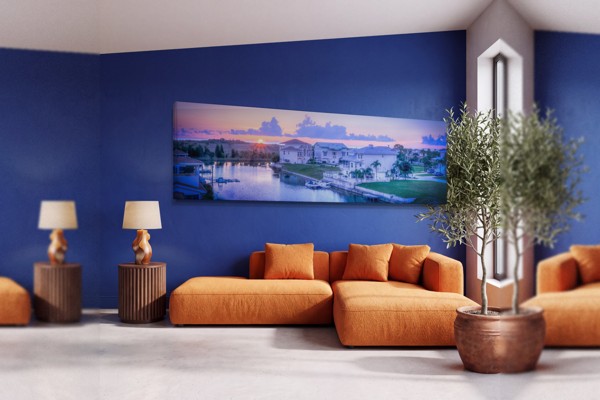 Zonsondergang Over Rivier Canvas Print - aan de muur in een interieur