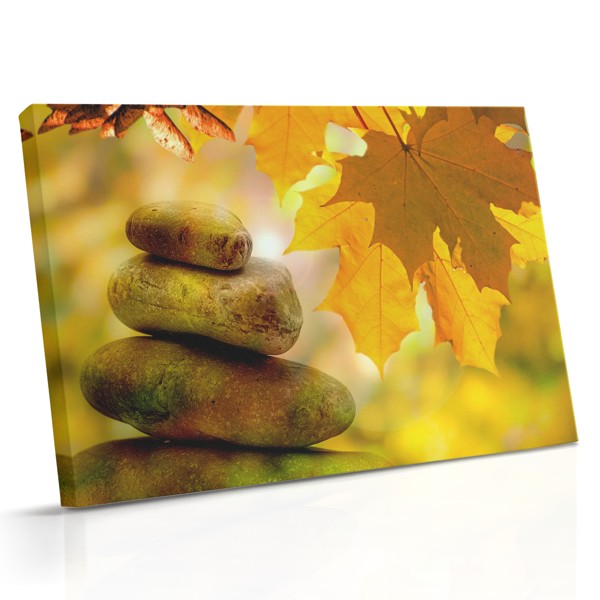 Herbstbaum und gestapelte Steine Leinwanddruck