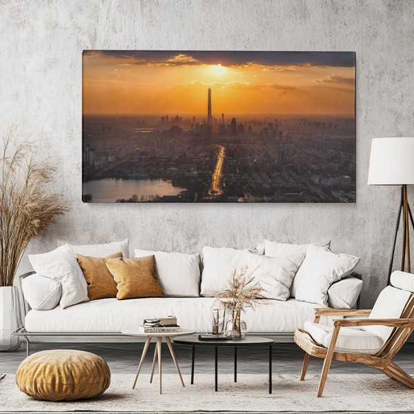 Sunrise Above the City Canvas Print - on the wall in a room interior